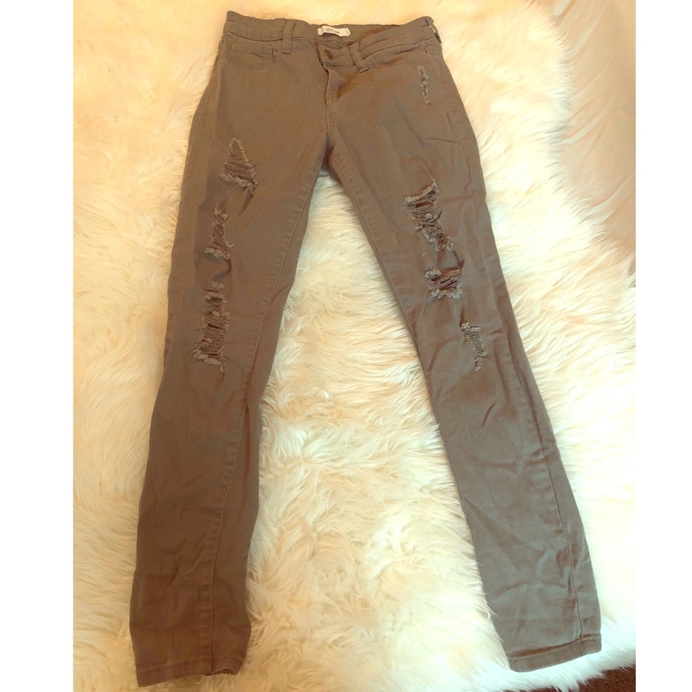 Army green distressed skinny jeans